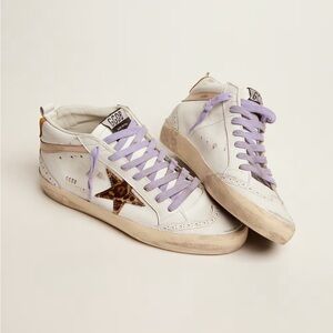 Golden goose mid star sneakers with pony skin star and orange heel tab